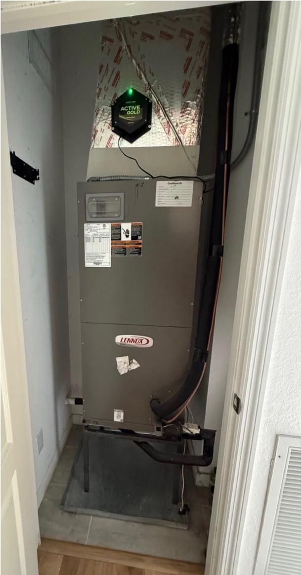 Older indoor air handler before replacement