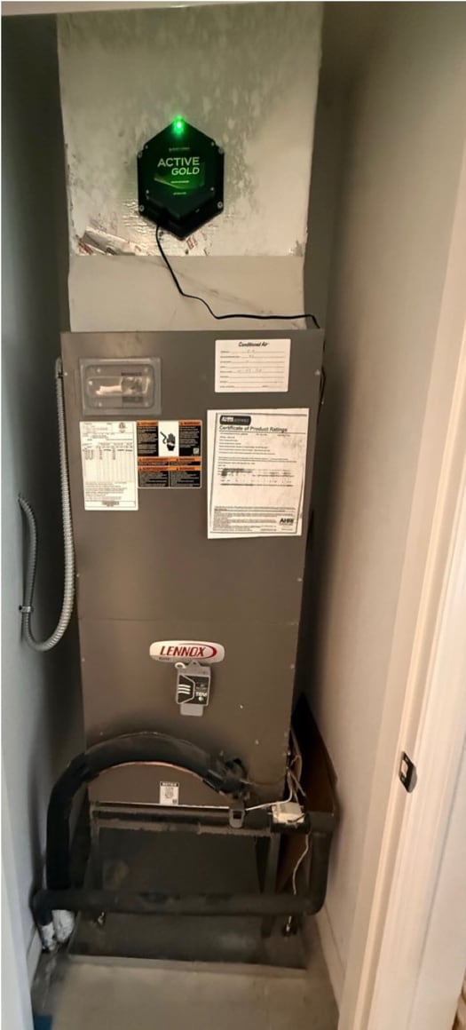 Older indoor air handler before replacement