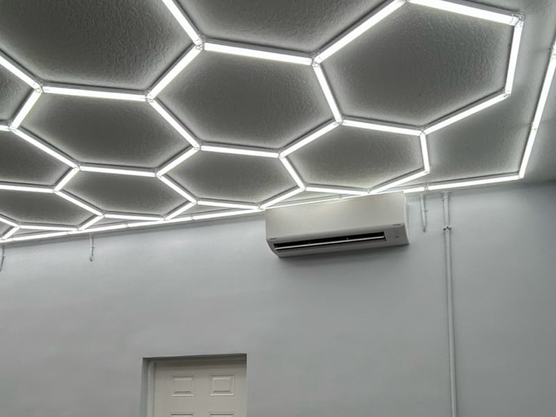 Wall-mounted mini-split installed in a finished garage